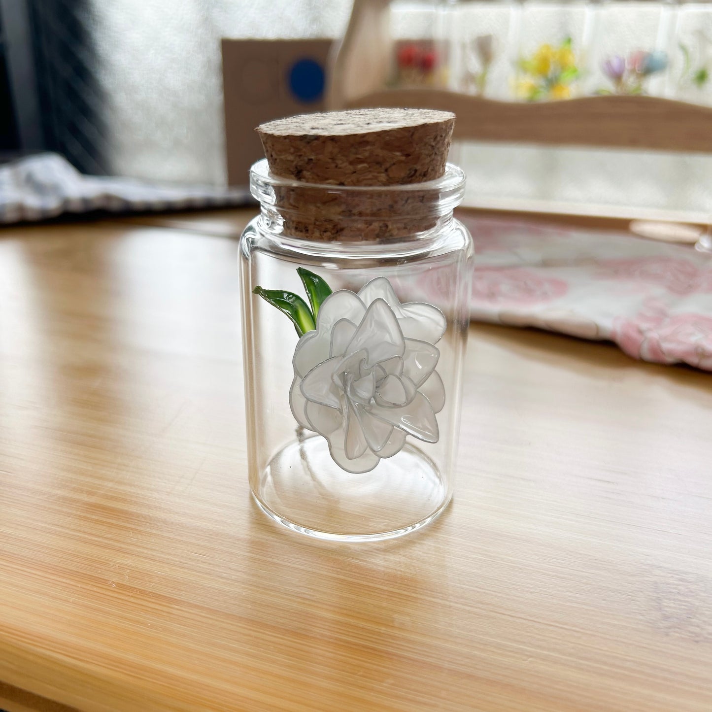 Lailo’s camellia flower in a jar