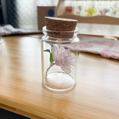 Lailo’s camellia flower in a jar